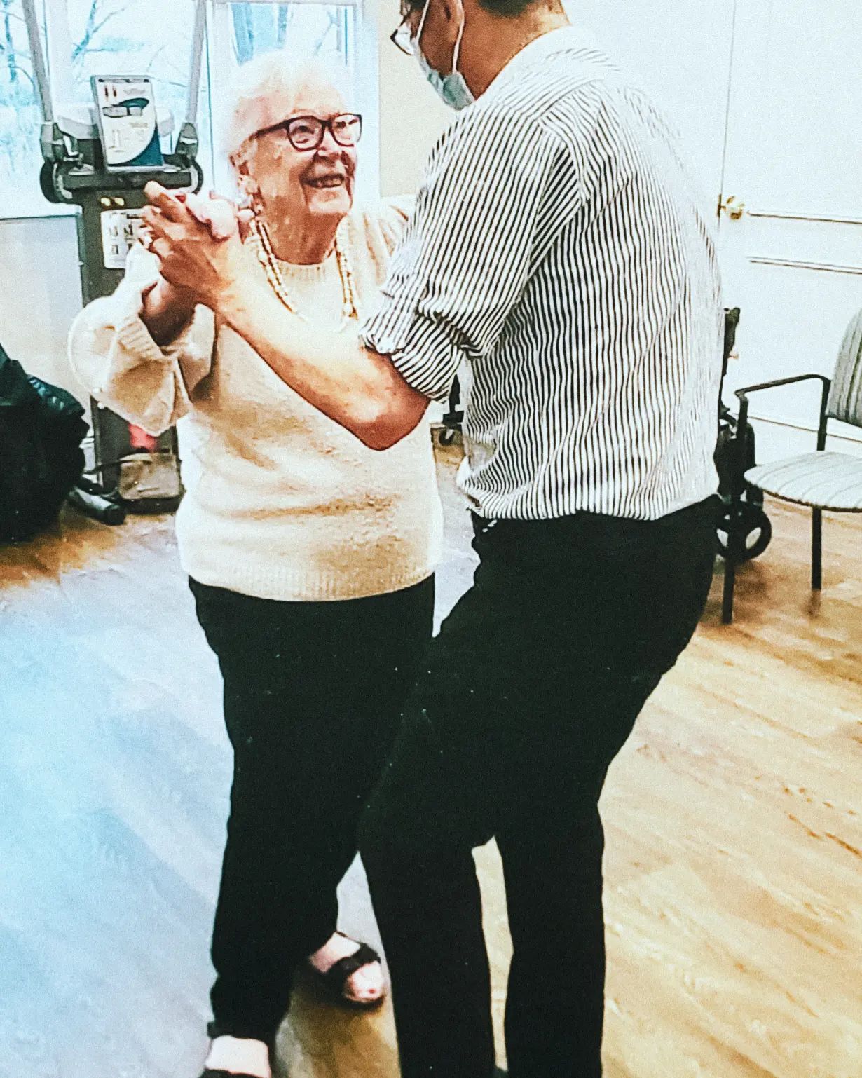 She said, Yes! – One day, I asked June to Dance. She tossed aside her walker and said "Yes"!
One of her fellow danceScape students snapped this secret photo. When we came to teach the next class, June presented us with the photo. It ended up being in Amica monthly newsletter. As well as framed now on our desk.
It's students like June that inspire us. Her favorite dance? The Quickstep!
#shallwedance?
